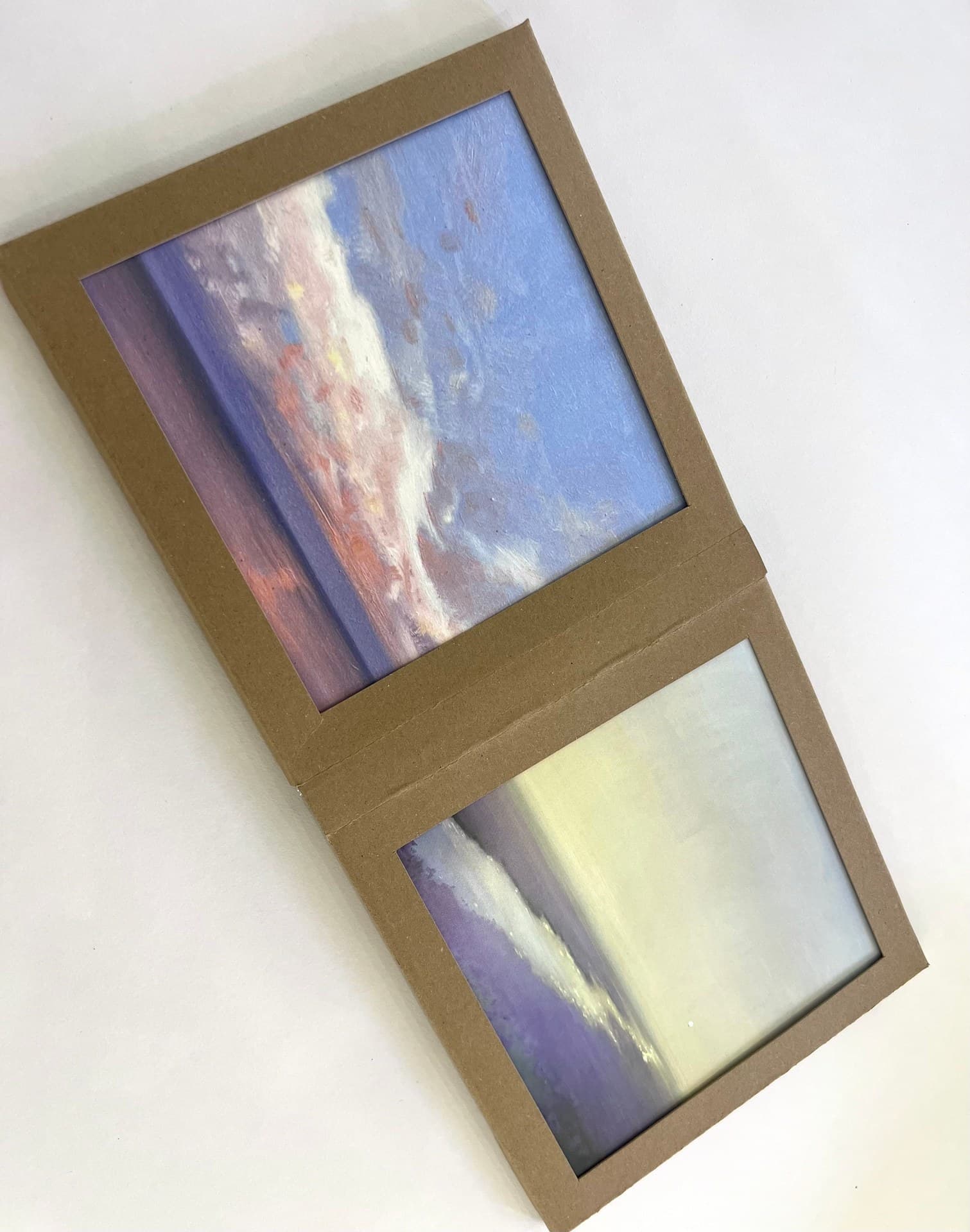 The open kraft presentation box showing the cards inside