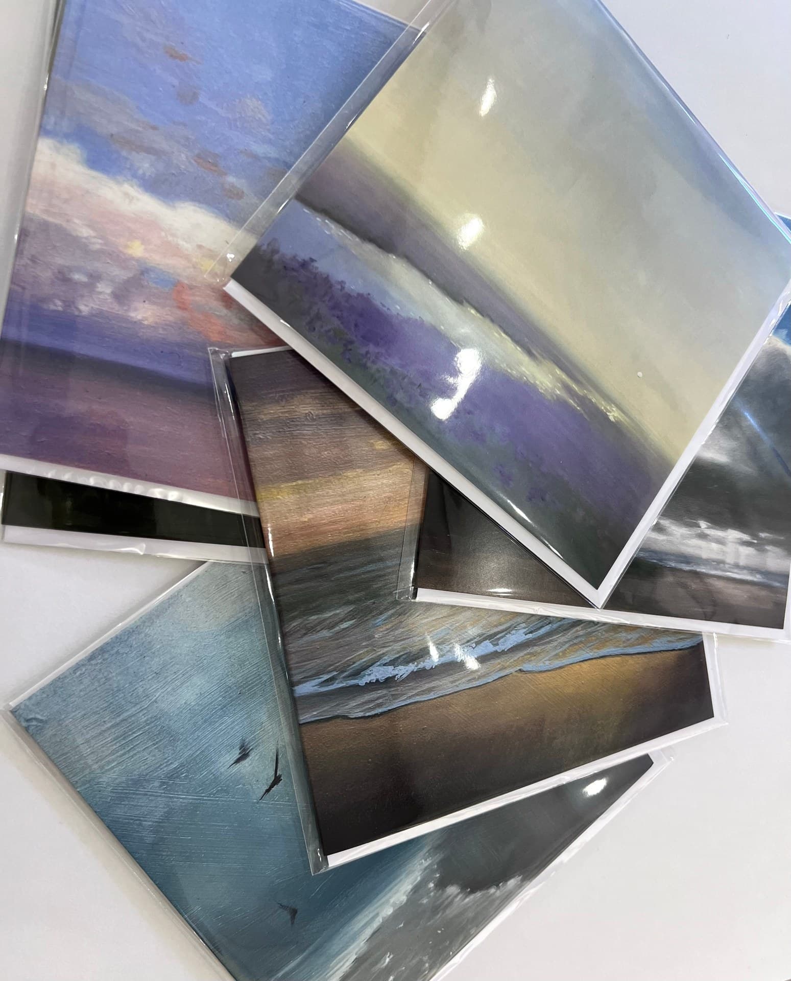 The six cards individually wrapped with envelopes